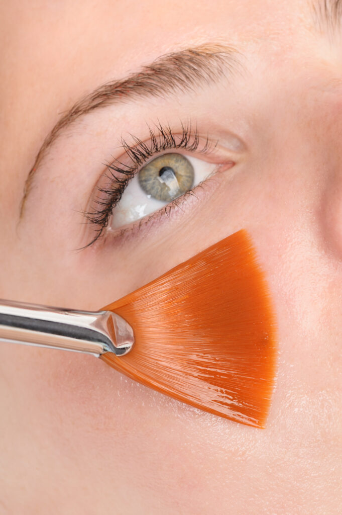 facial peeling mask applying